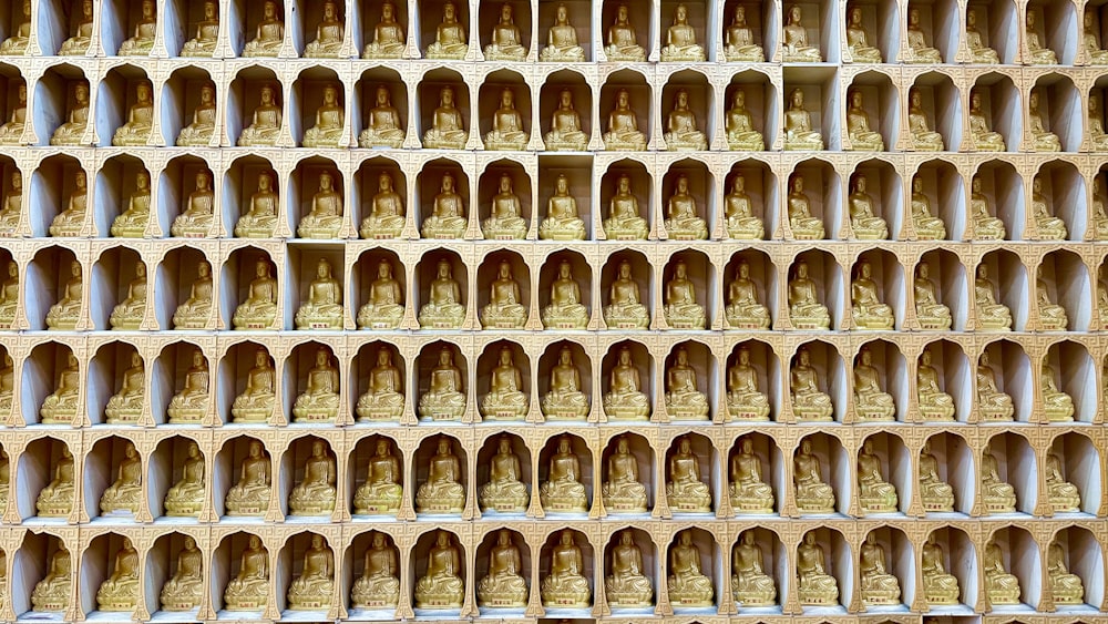 a bunch of bells that are on a wall