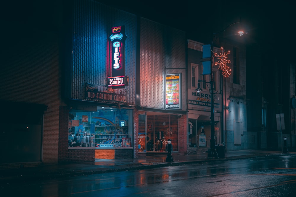 a city street at night in the rain