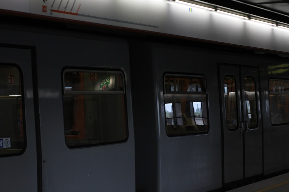 a subway car with its doors open at night