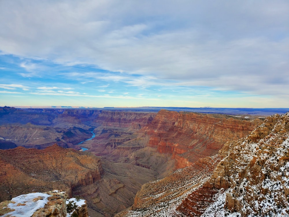 a view of the grand canyon in winter