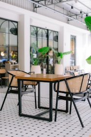a table and chairs in a large room