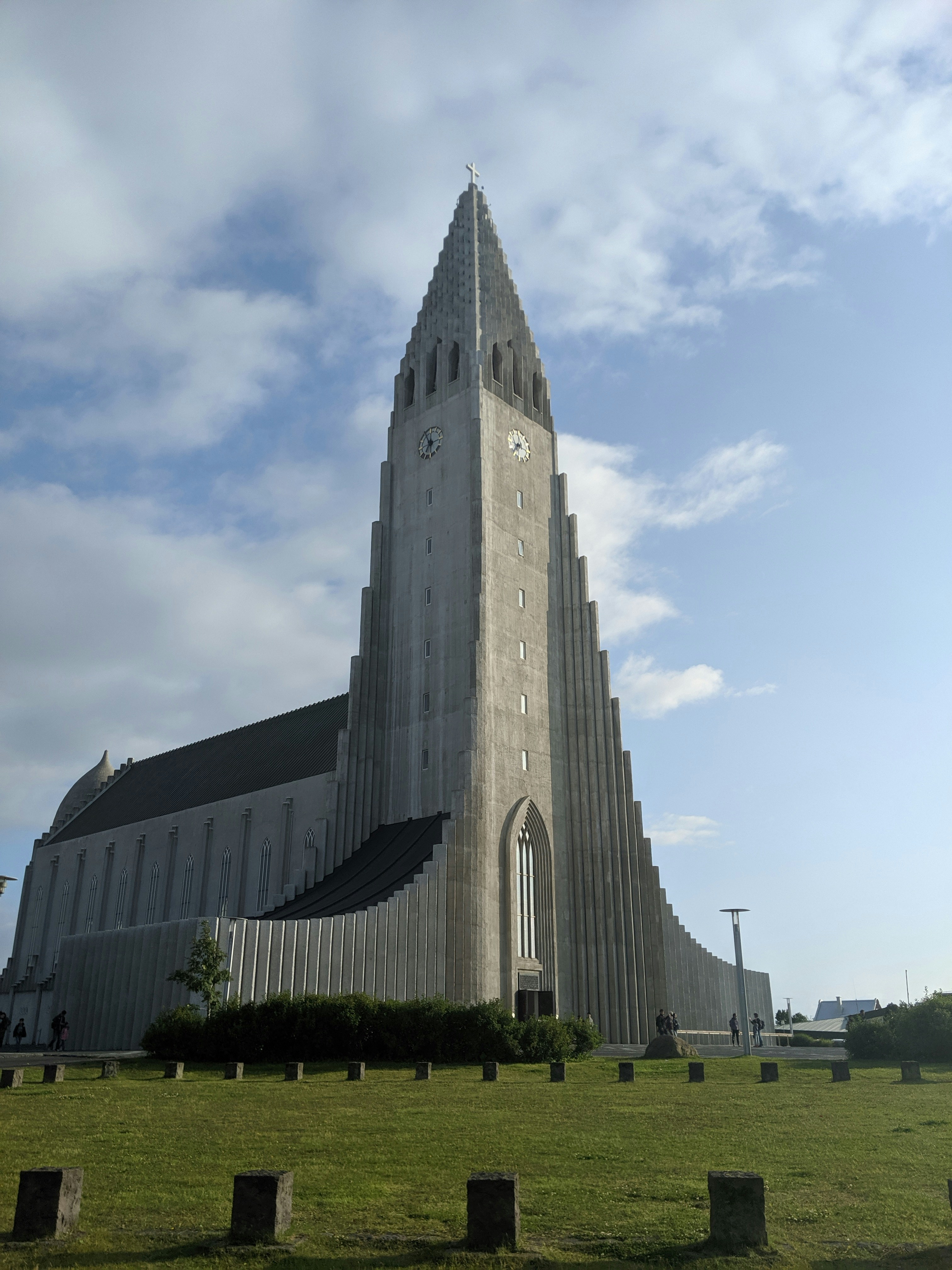 a very tall building with a clock on it's side
