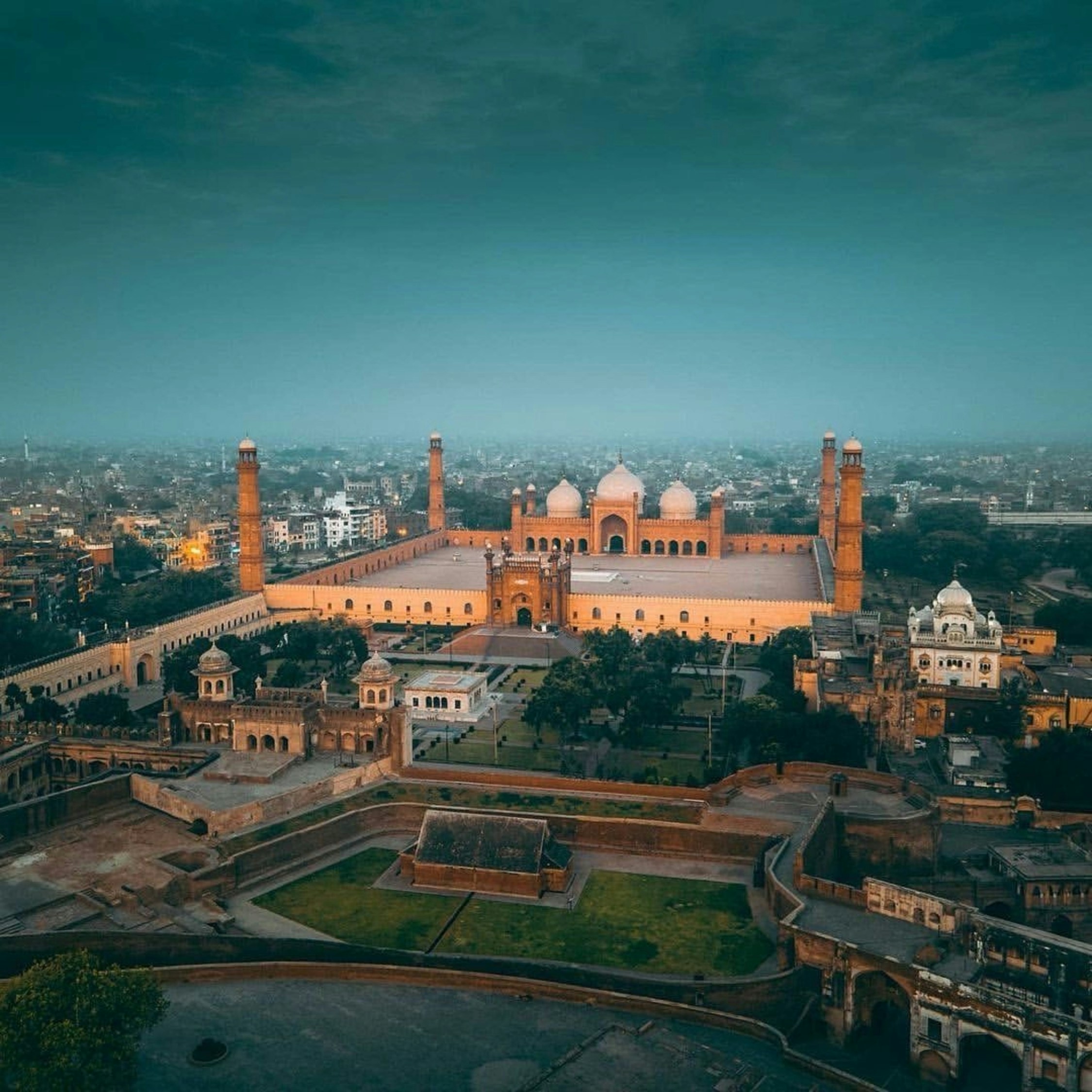 an aerial view of a large building in india