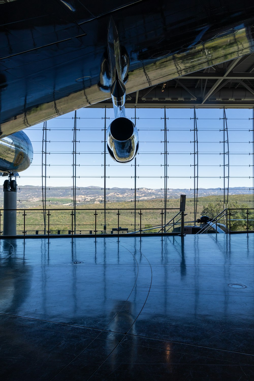 an airplane hanging upside down in a hanger