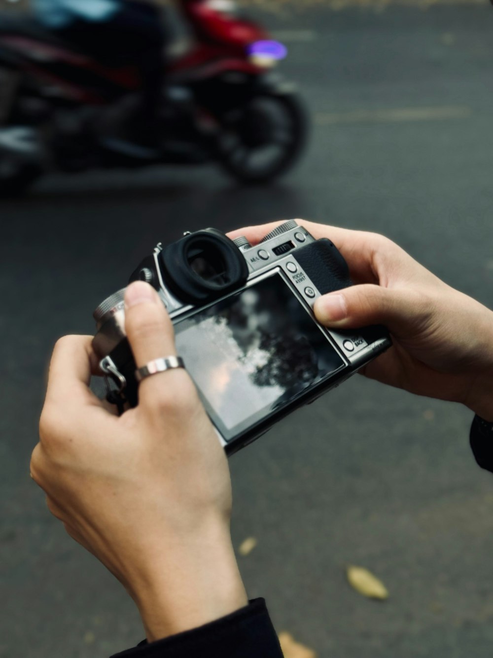 a person taking a picture with a camera