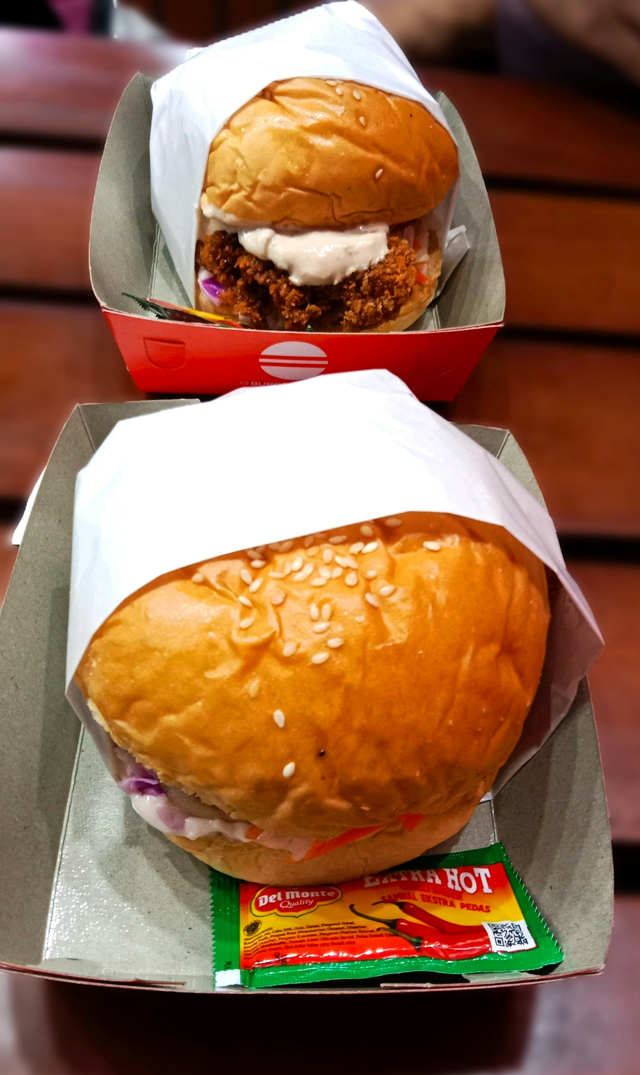 a close up of a sandwich in a box on a table