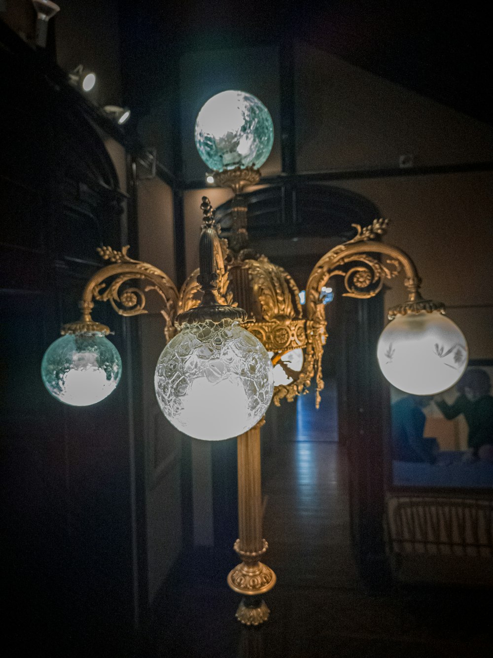 a chandelier hanging from a ceiling in a room