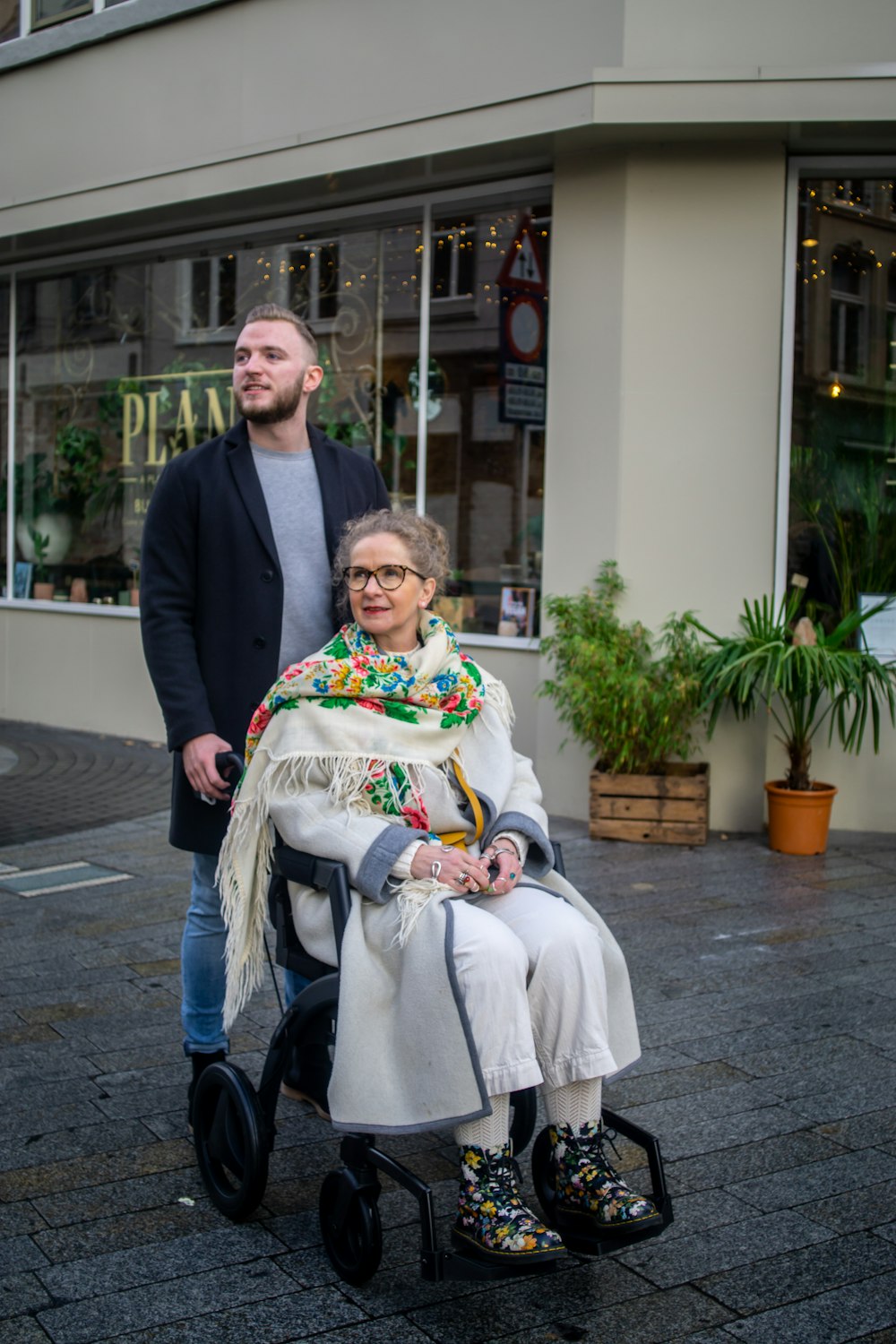 a man and a woman standing next to each other