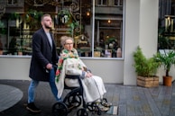 a man and a woman walking down a street