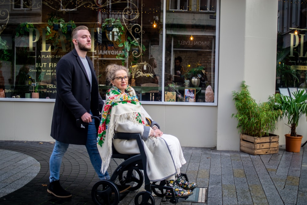 a man and a woman walking down a street