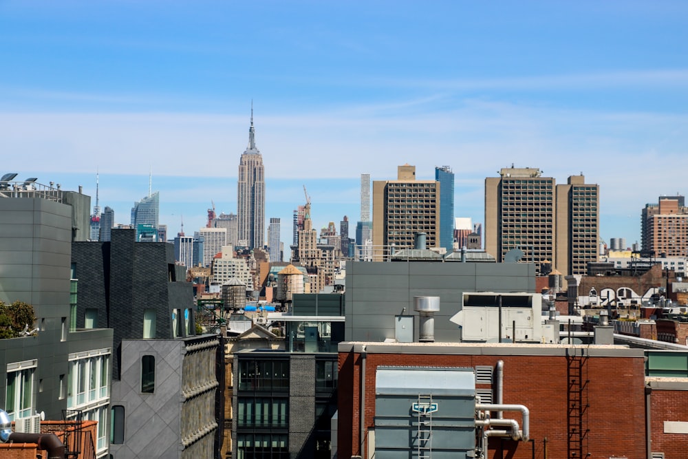 a view of a city skyline from a rooftop