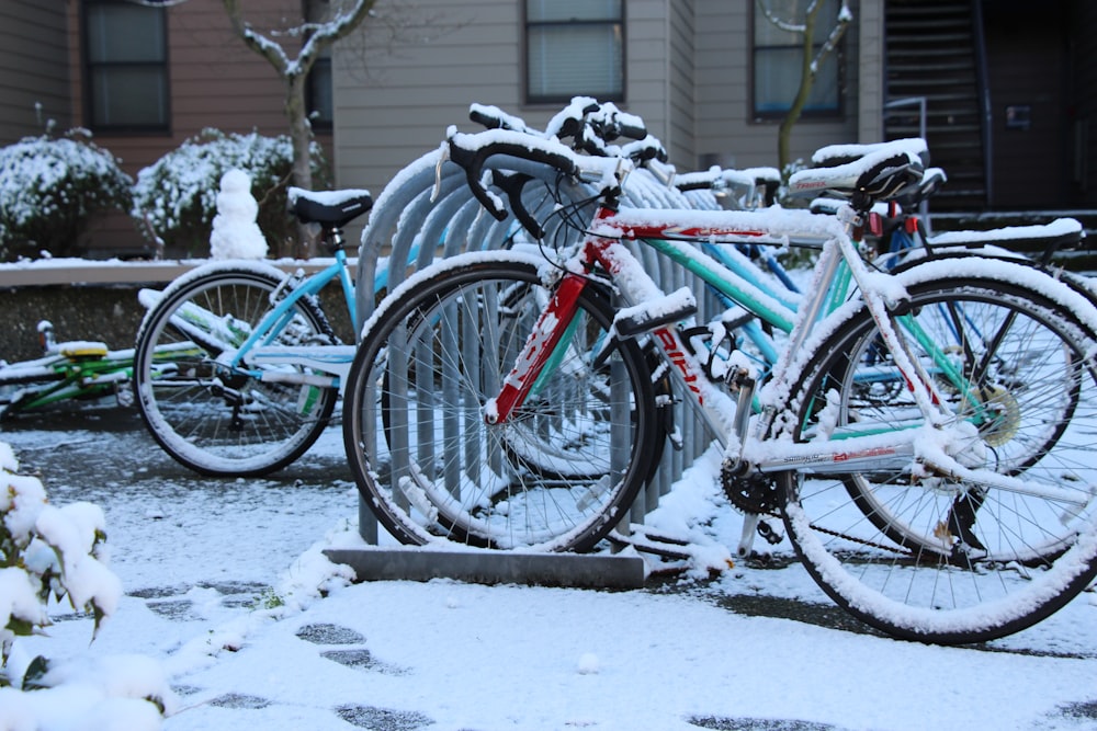 a bunch of bikes that are sitting in the snow