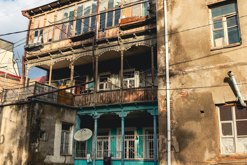 an old building with a balcony and balconies