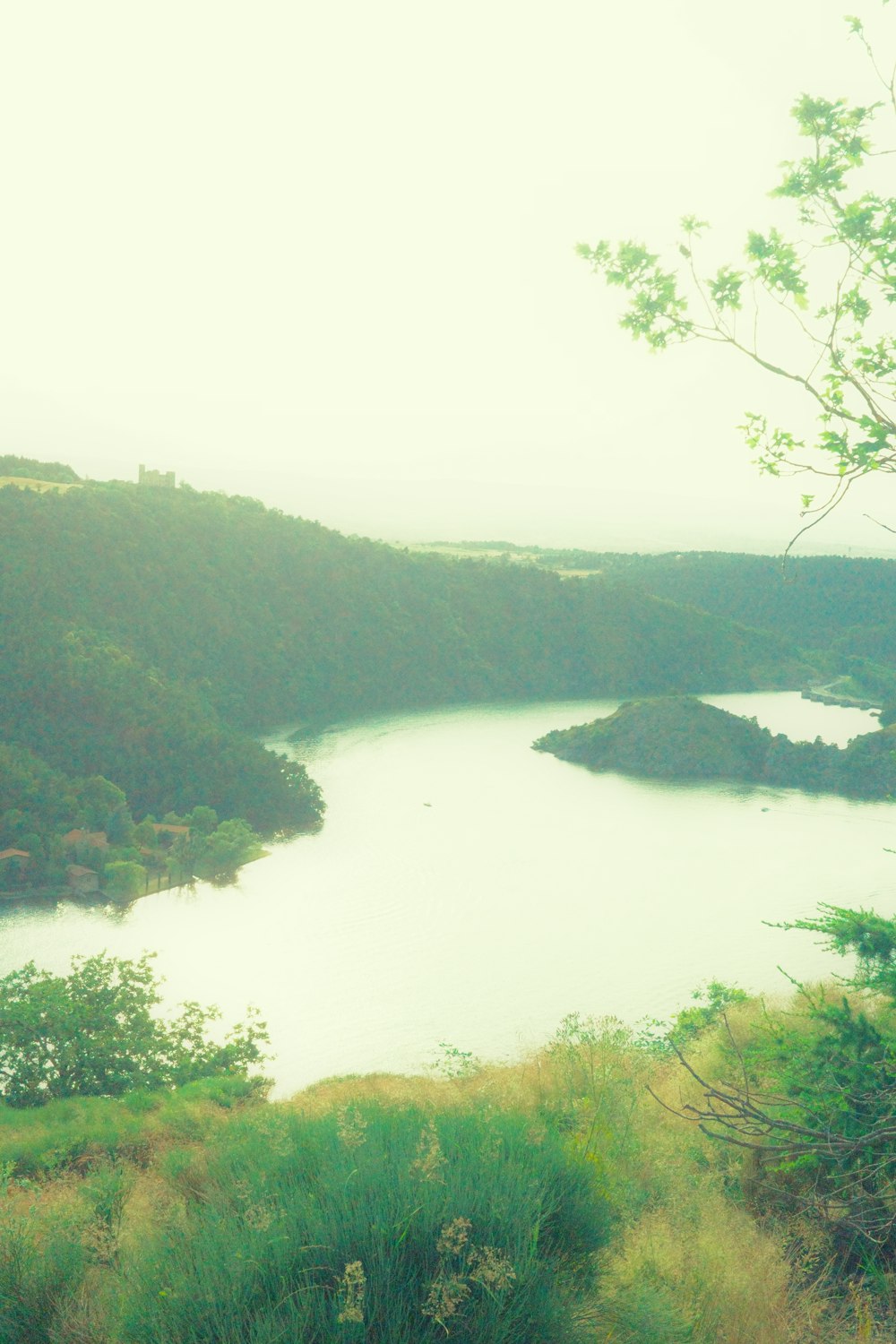 a view of a body of water from a hill