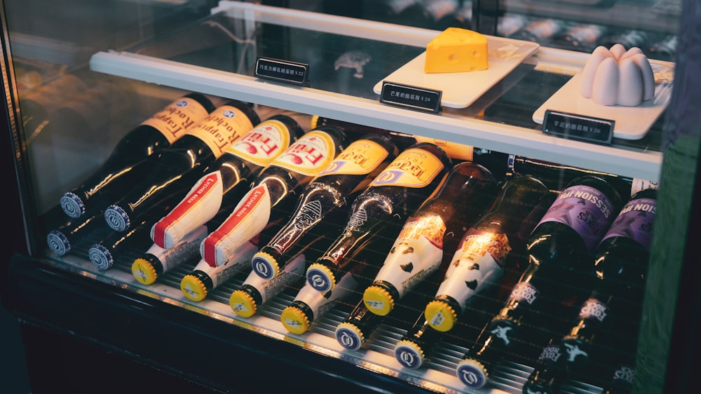 a display case filled with lots of bottles of wine