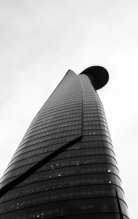 a black and white photo of a tall building
