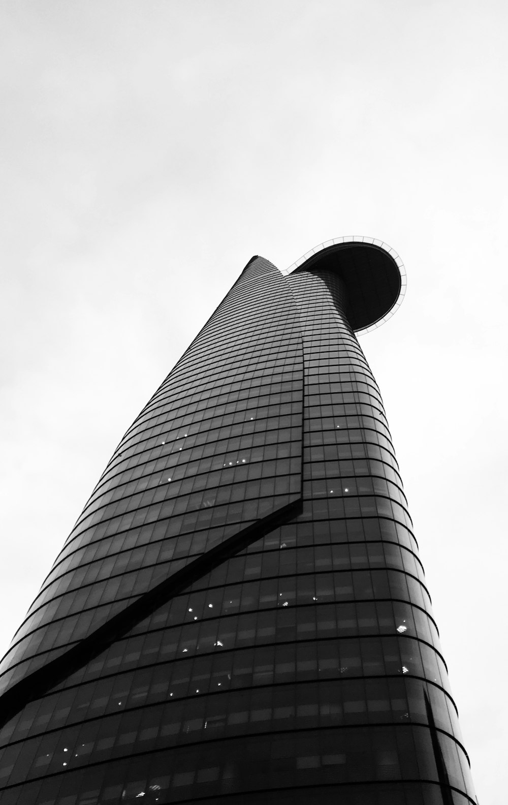 a black and white photo of a tall building