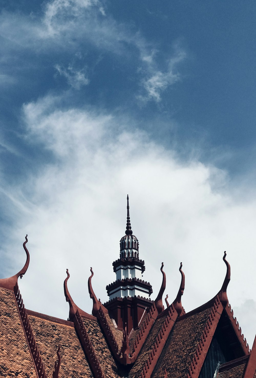 a tall building with a clock on the top of it