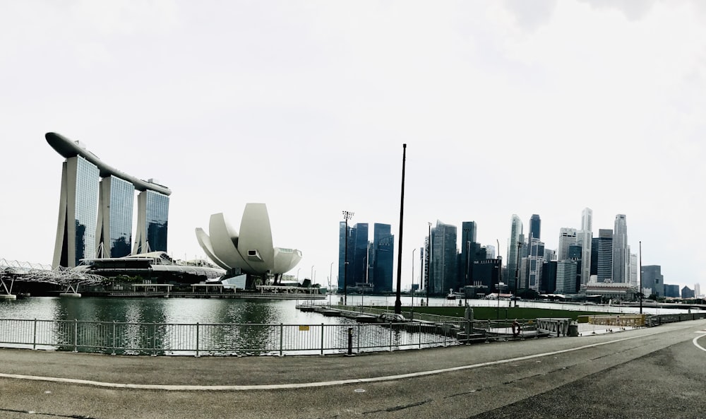 a large body of water with a city in the background