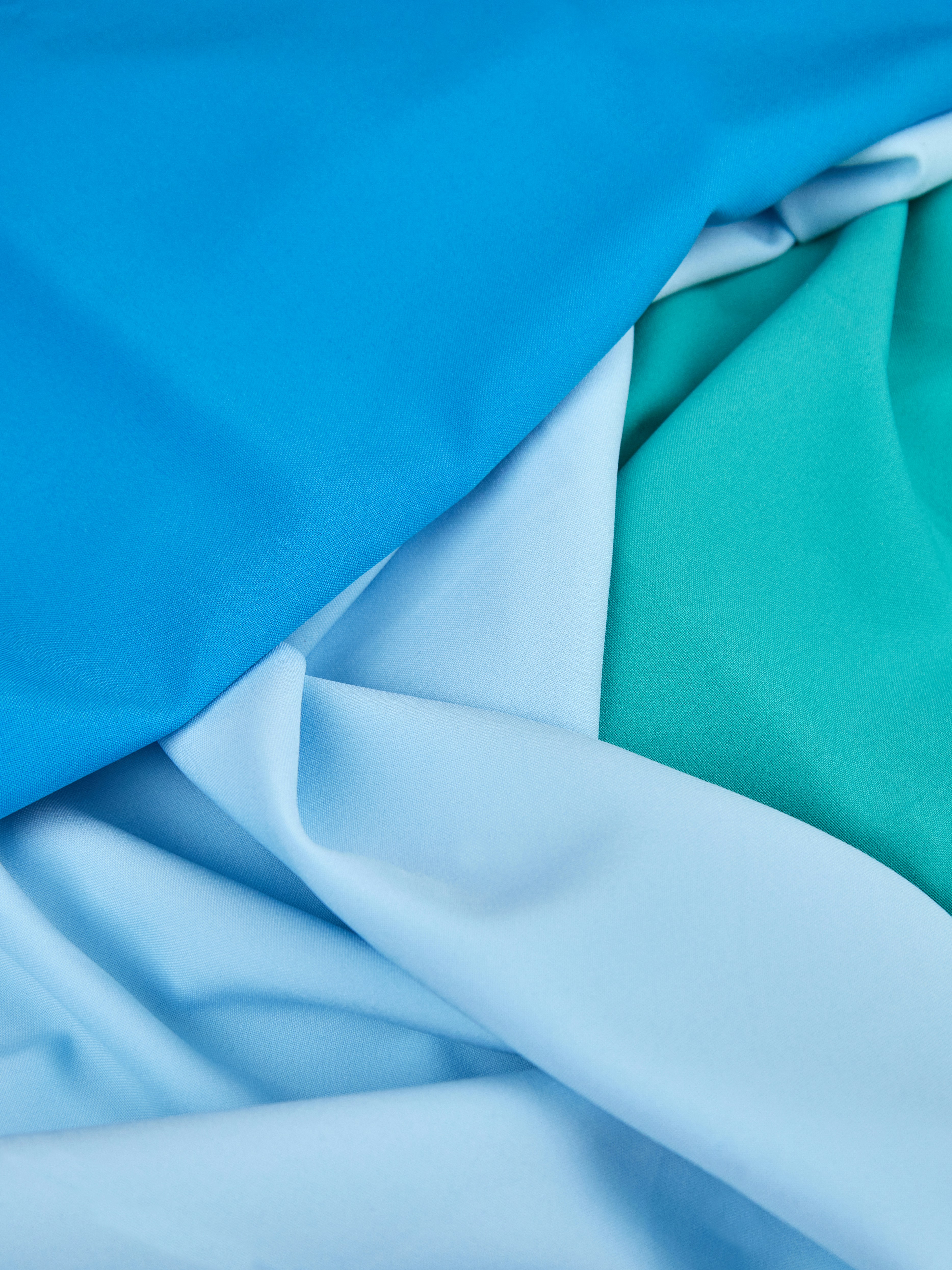 a close up of a blue and white fabric