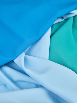 a close up of a blue and white fabric