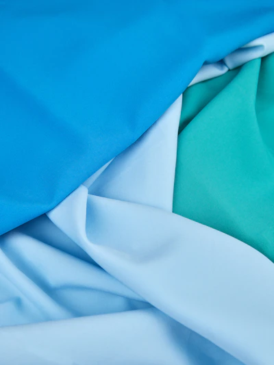 a close up of a blue and white fabric