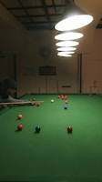 a pool table with several balls on it