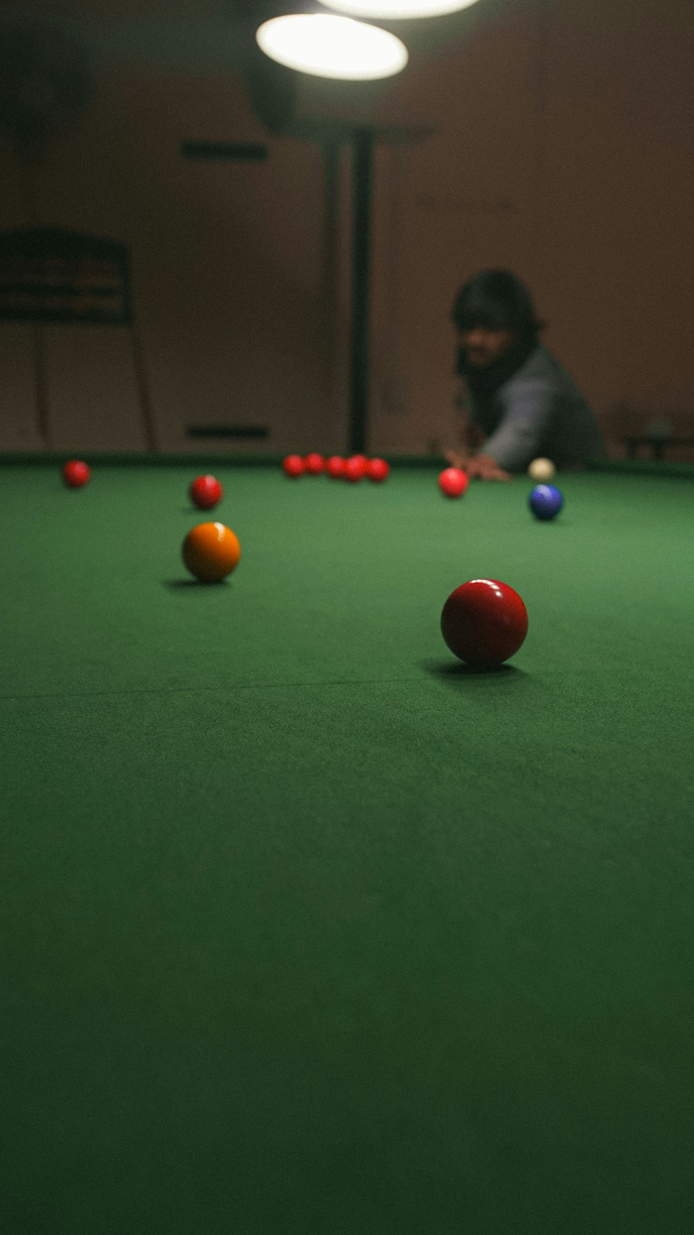 a pool table with several balls on it