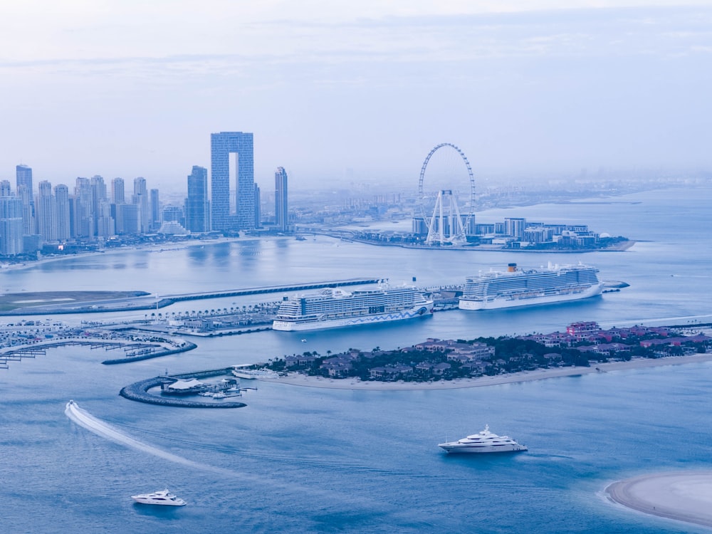 a large body of water with a city in the background