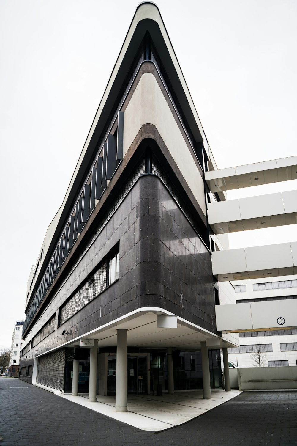 a large building with a very tall triangular roof