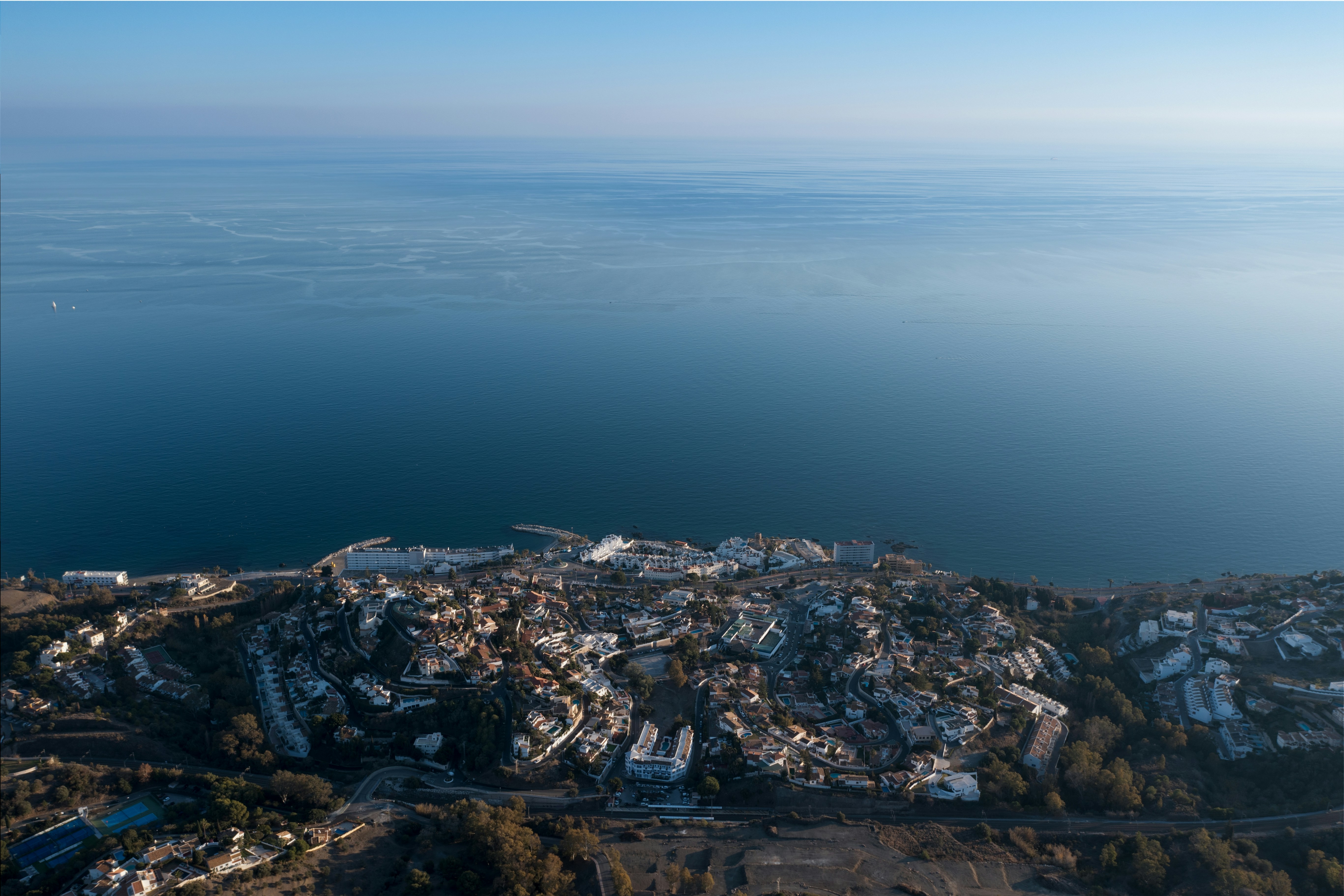 Landscape · an aerial view of a city by the water