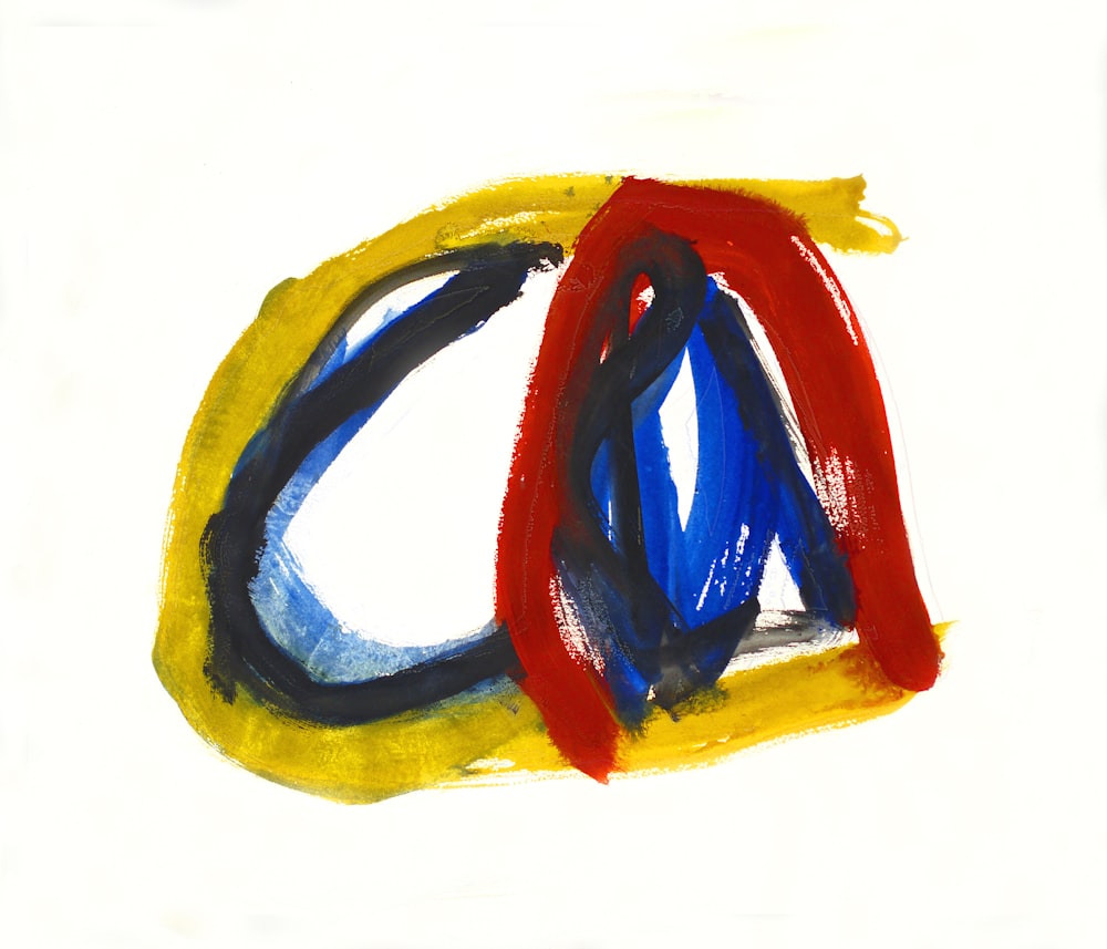 un dessin d’une lettre avec un motif rouge, bleu et jaune