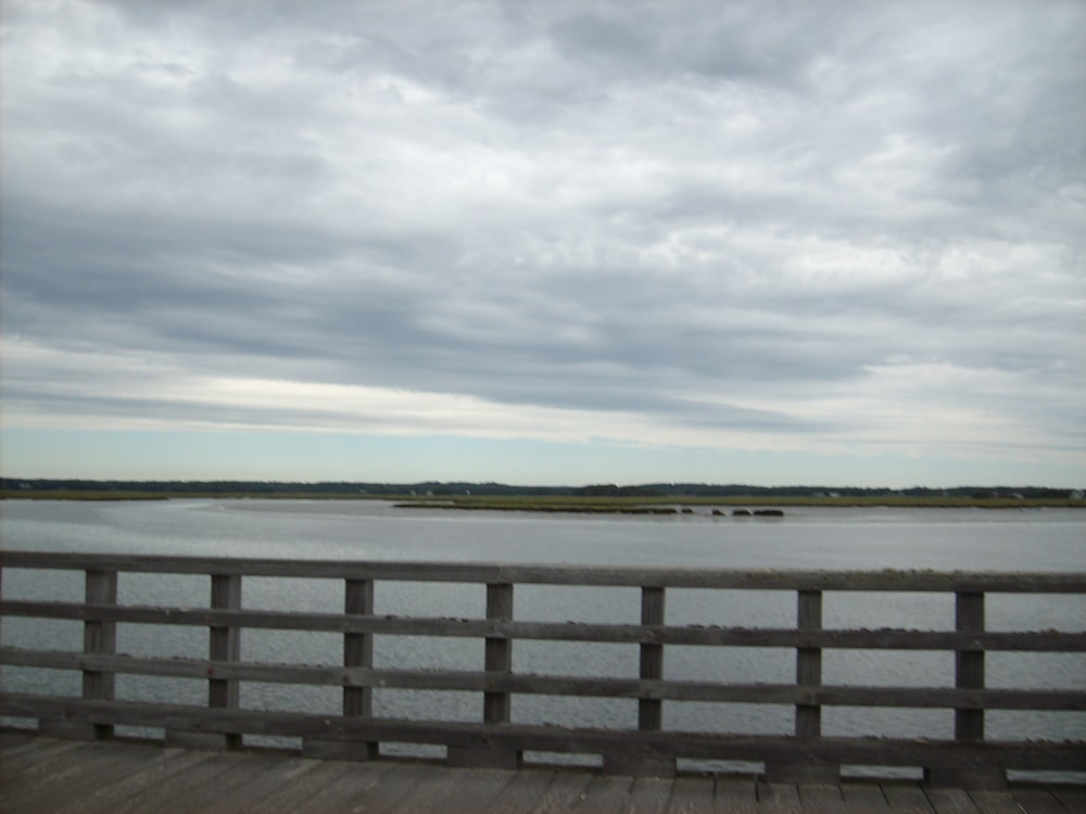 a view of a body of water from a bridge