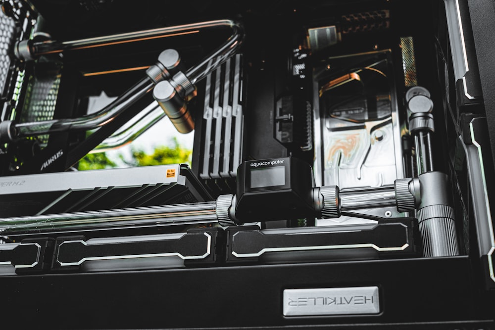 a close up of a computer case with wires attached to it