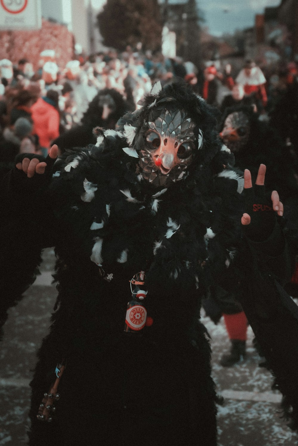 a group of people dressed in costumes and masks