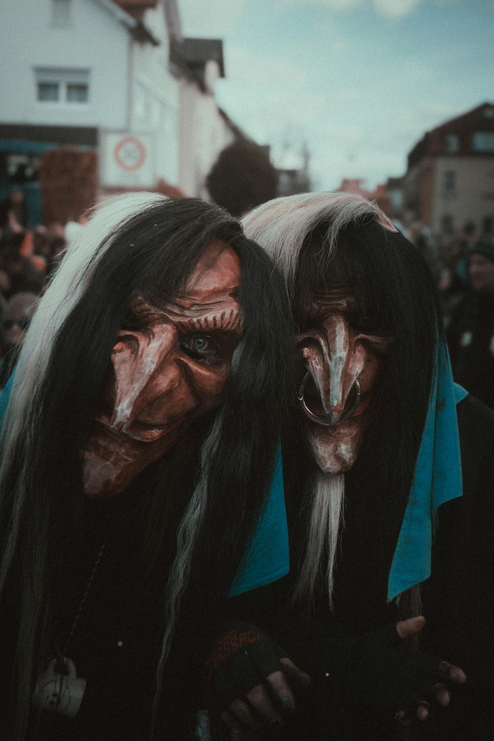 a couple of people that are standing in the street