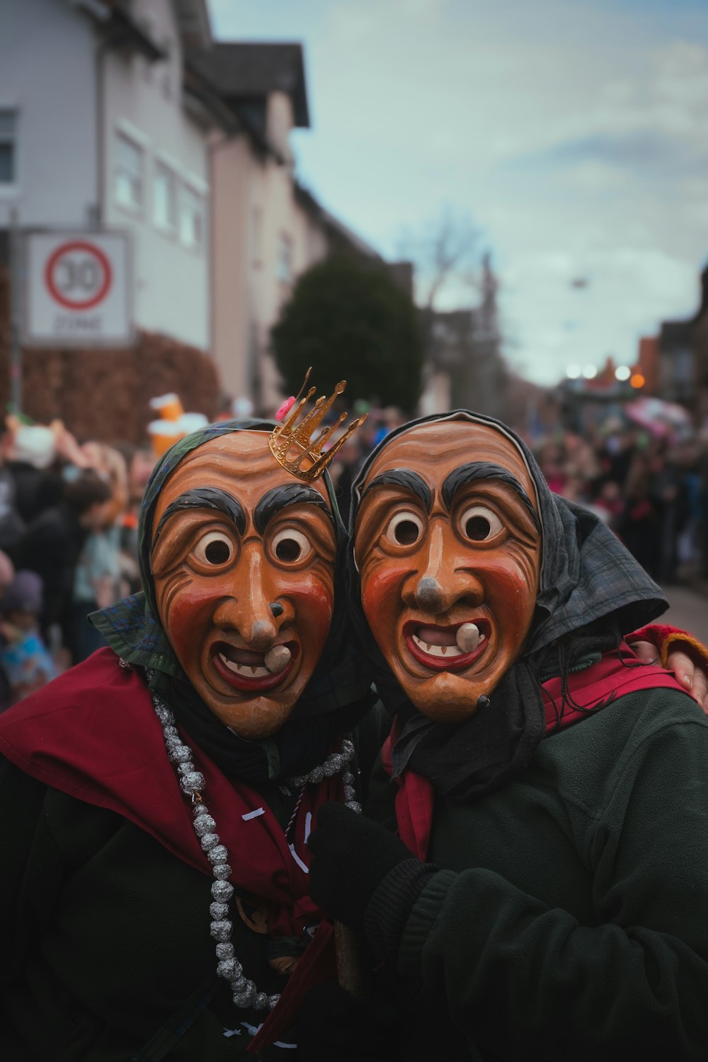 a couple of people that are standing in the street