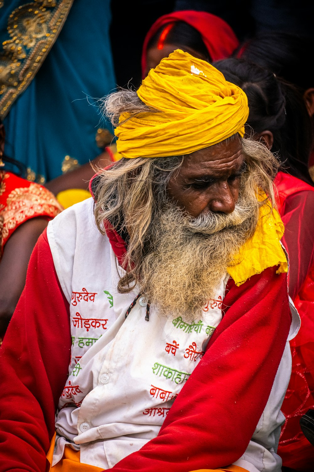 a man with a yellow turban and a beard