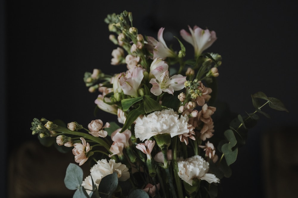 a bouquet of flowers sitting on top of a table