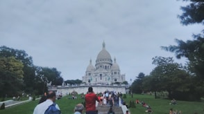a group of people walking up a set of stairs