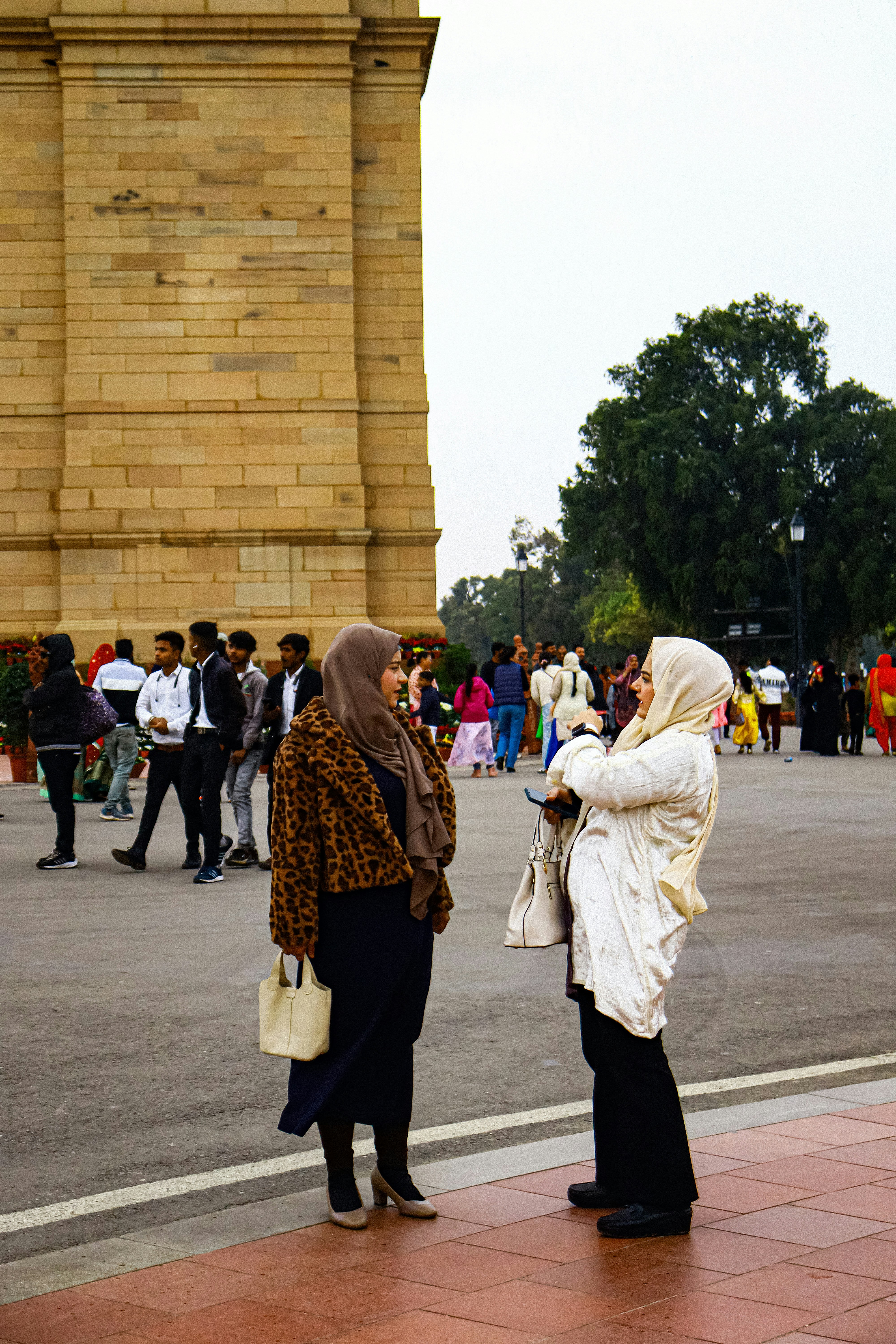 a couple of women standing next to each other