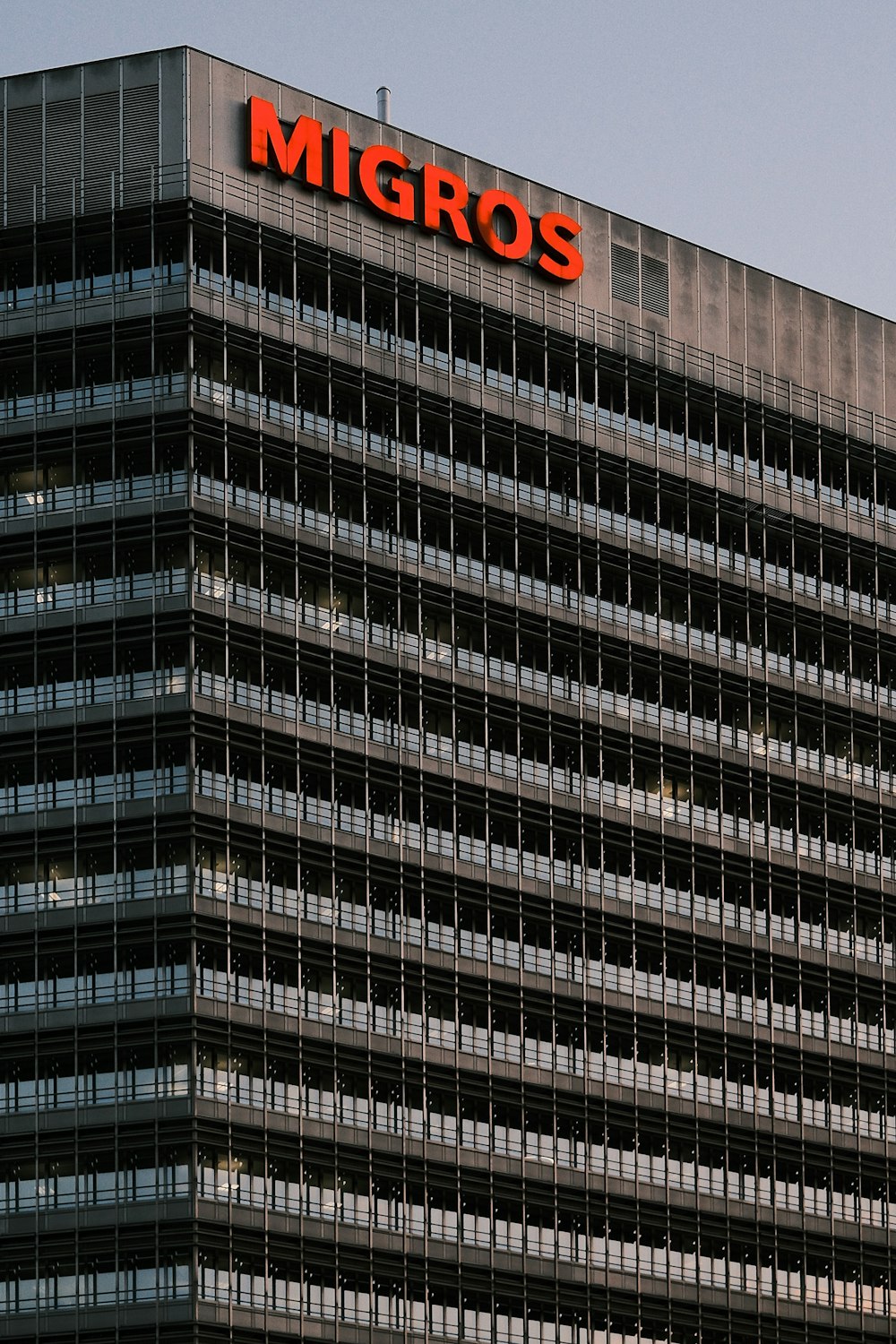 a large building with a sign on top of it