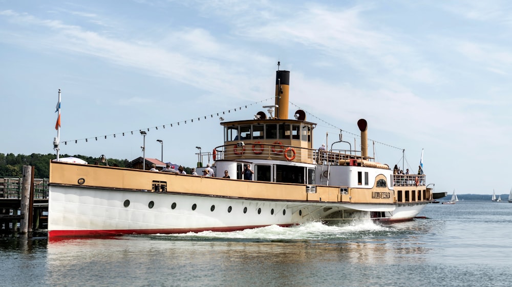 a large boat traveling across a body of water