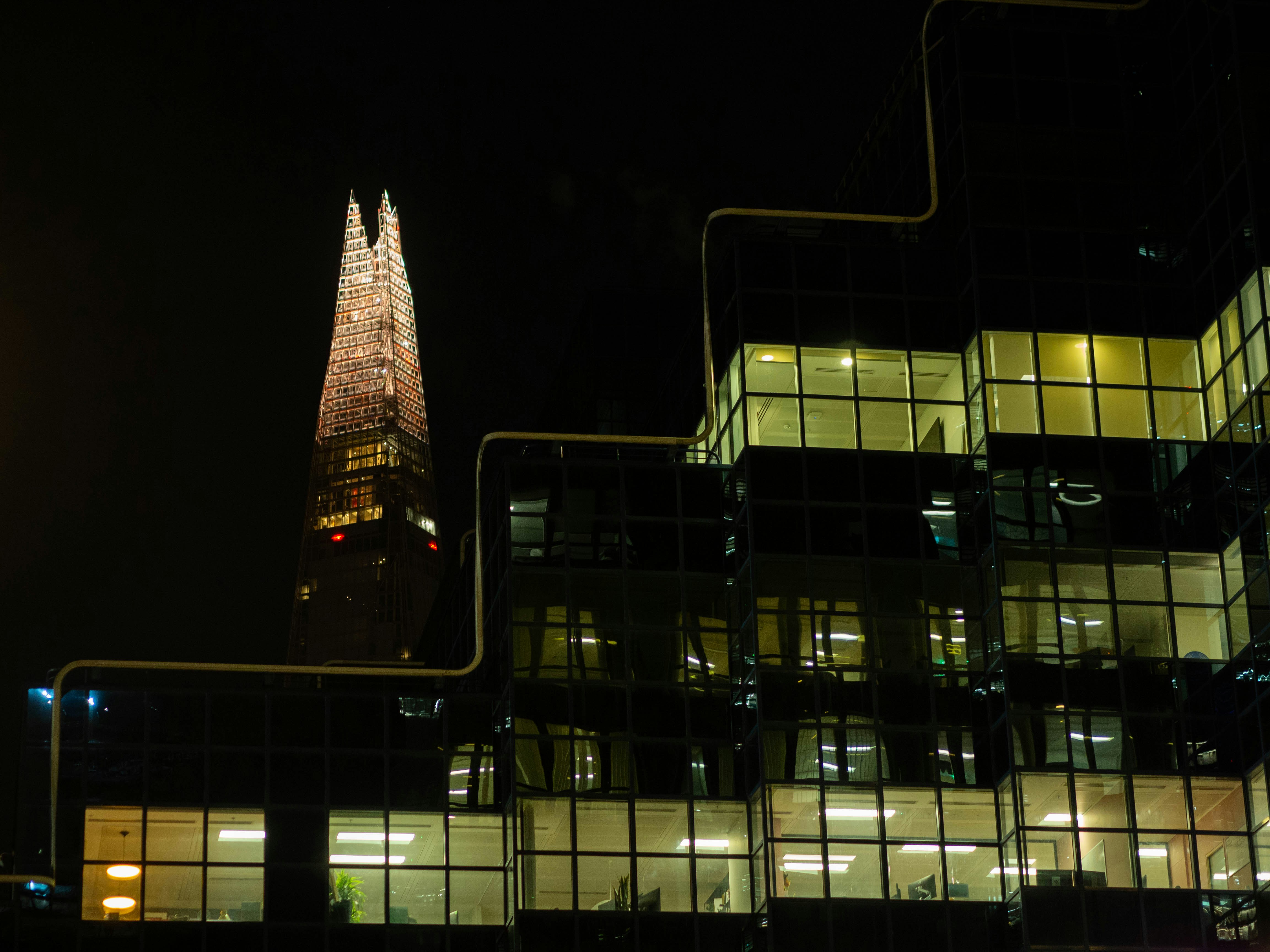 a very tall building lit up at night