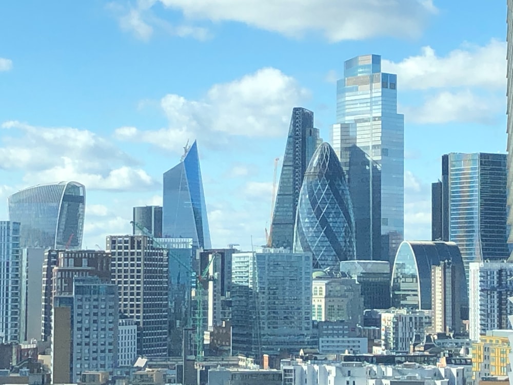 a view of the city of london from the top of a building