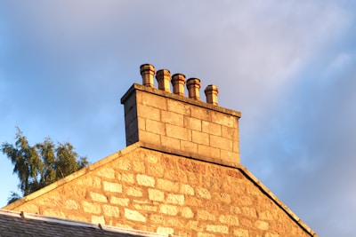 a brick chimney on top of a building