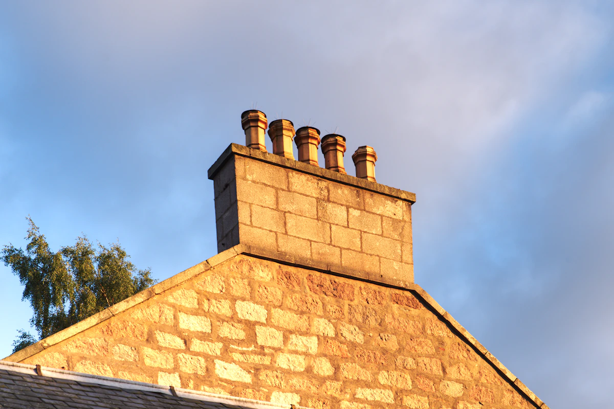 Brick chimney against sky