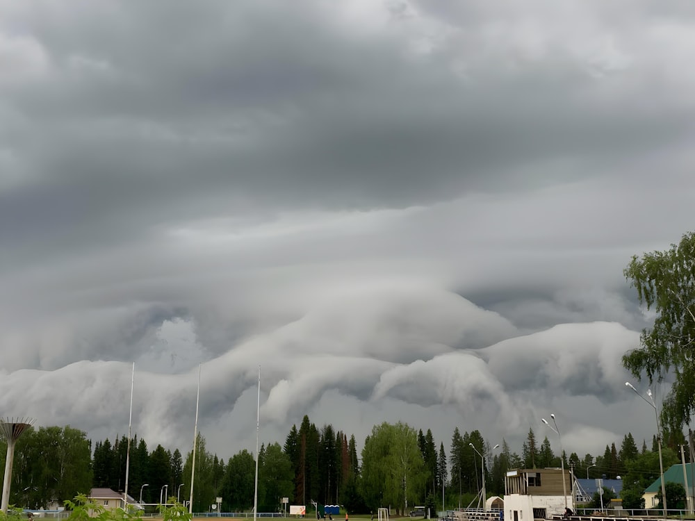 a group of clouds that are in the sky