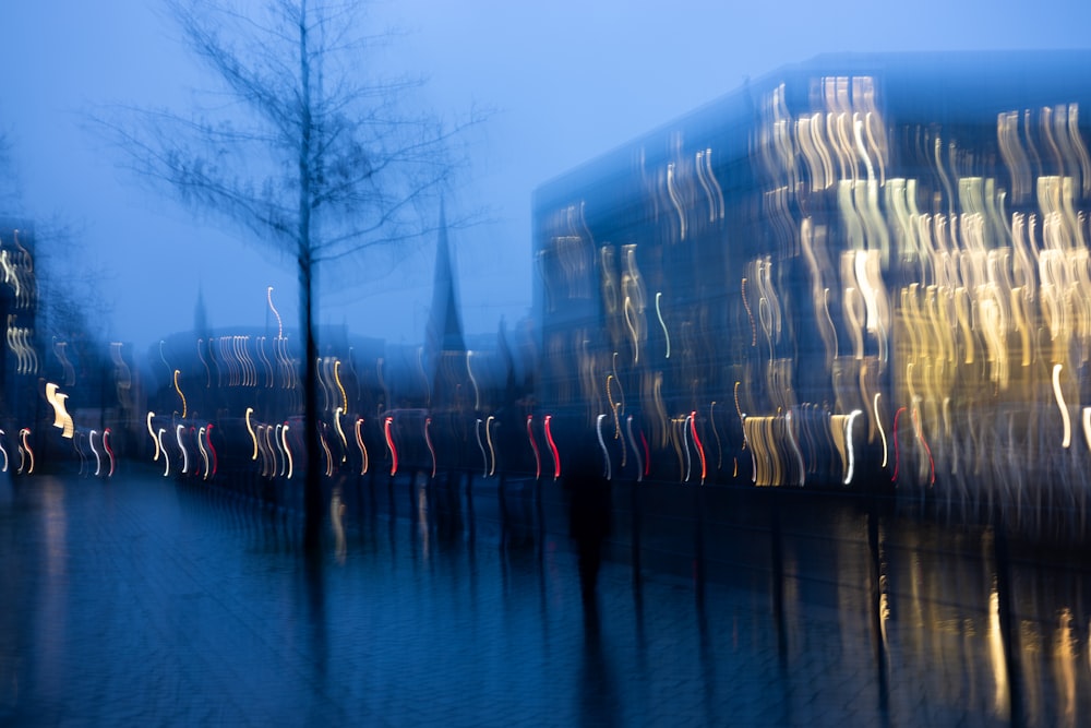 a blurry photo of a city street at night