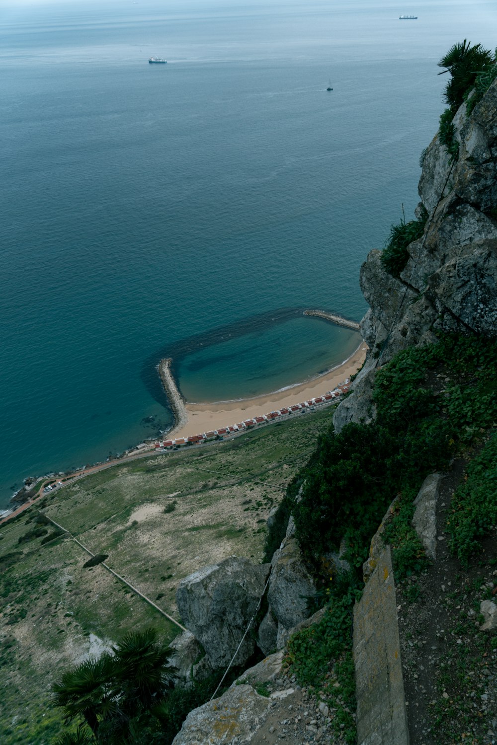 a view of a body of water from a cliff